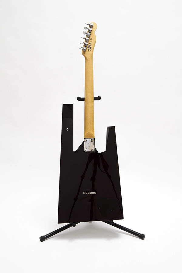 The back of the Chessmaster II on a guitar stand